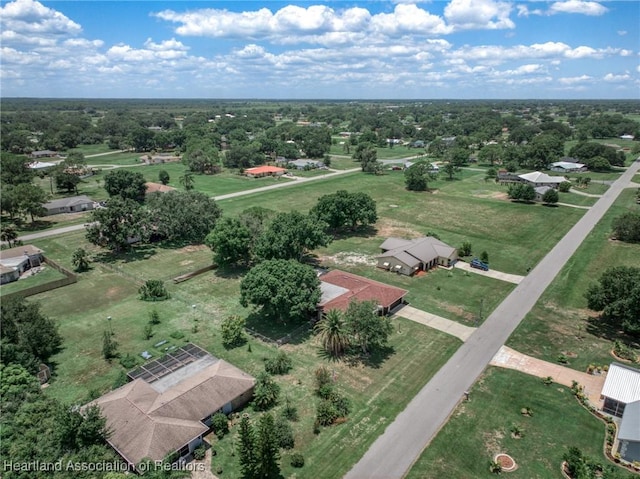 birds eye view of property with a rural view