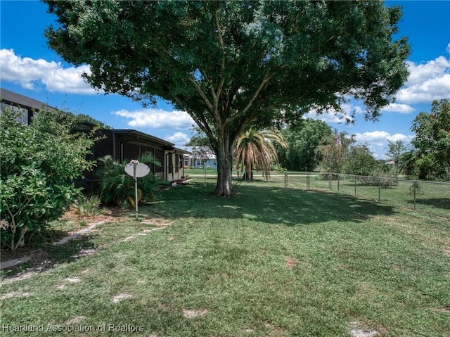 view of yard featuring fence