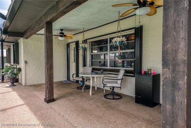 view of patio / terrace with a ceiling fan