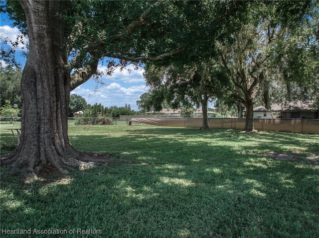 view of yard featuring fence