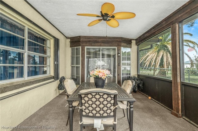 sunroom / solarium with ceiling fan