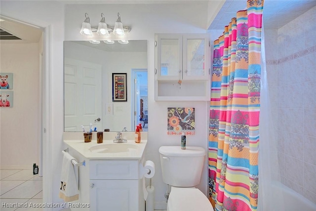 full bathroom with tile patterned floors, vanity, toilet, and shower / tub combo with curtain