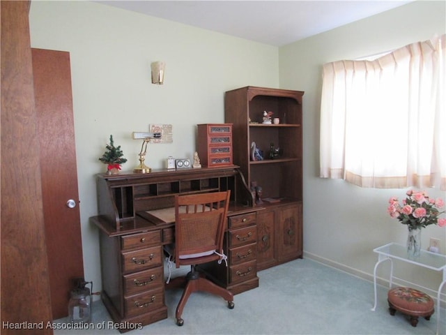 office area featuring carpet floors and baseboards