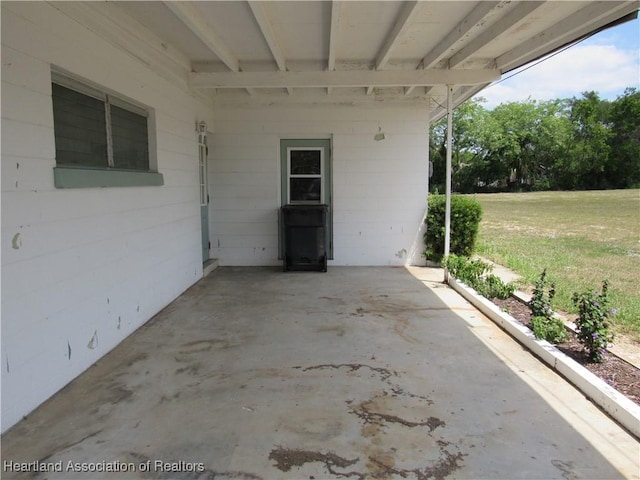 view of patio / terrace with a carport