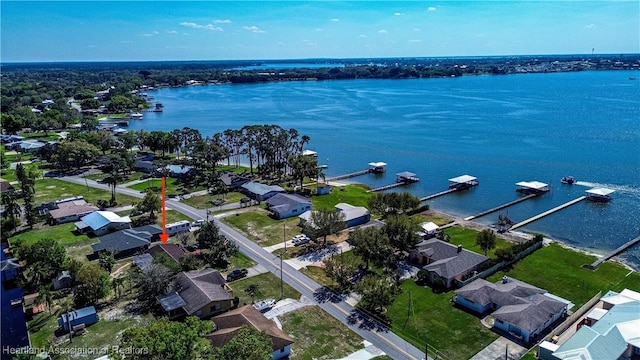 aerial view with a residential view and a water view