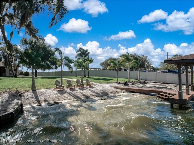 exterior space with a water view