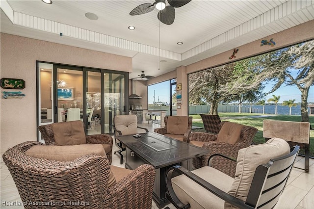 view of patio / terrace with an outdoor hangout area and ceiling fan