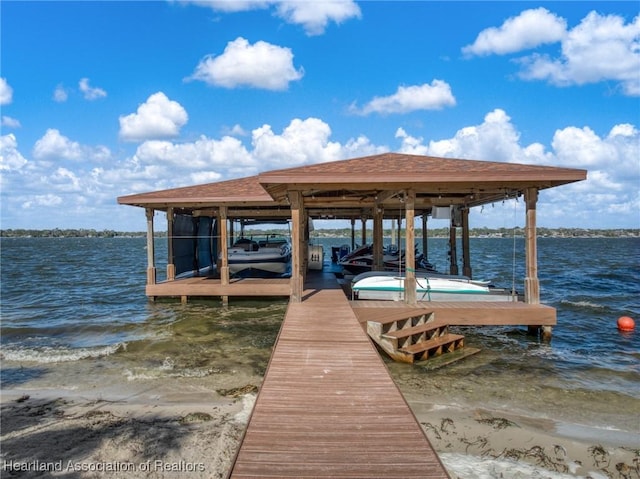 dock area with a water view