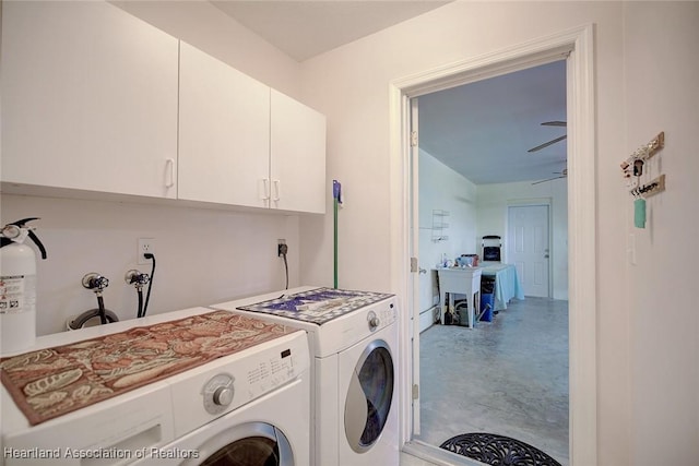 clothes washing area featuring cabinets, ceiling fan, washing machine and dryer, and sink