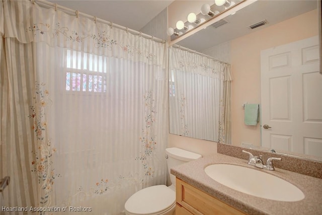 full bathroom with vanity, toilet, and shower / bathtub combination with curtain