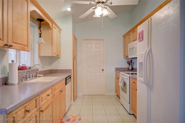 kitchen with light brown cabinetry, white appliances, ceiling fan, sink, and lofted ceiling