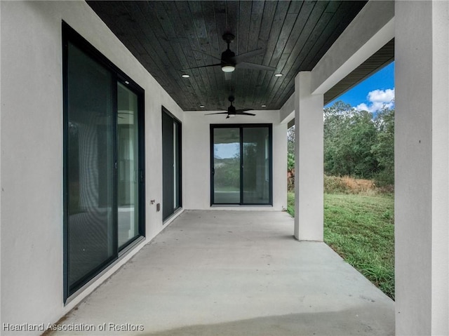 view of patio / terrace featuring ceiling fan