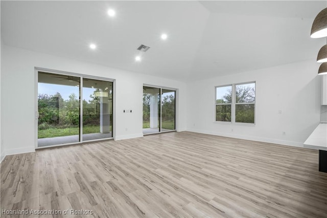 unfurnished living room with light wood-type flooring