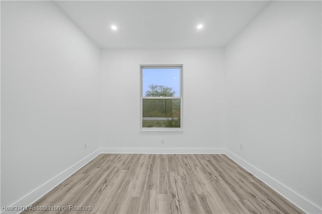 unfurnished room featuring light hardwood / wood-style flooring