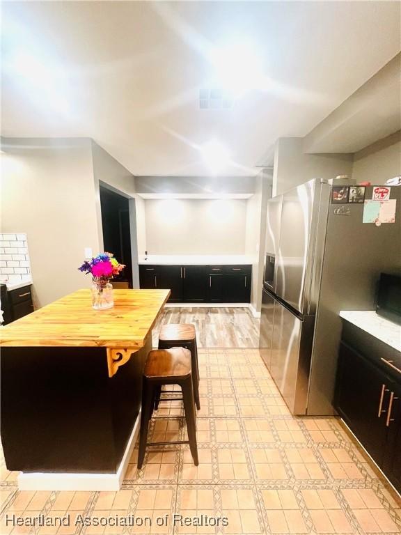 300 Whatley Blvd, Sebring, FL 33870 - dining space with light wood-style flooring