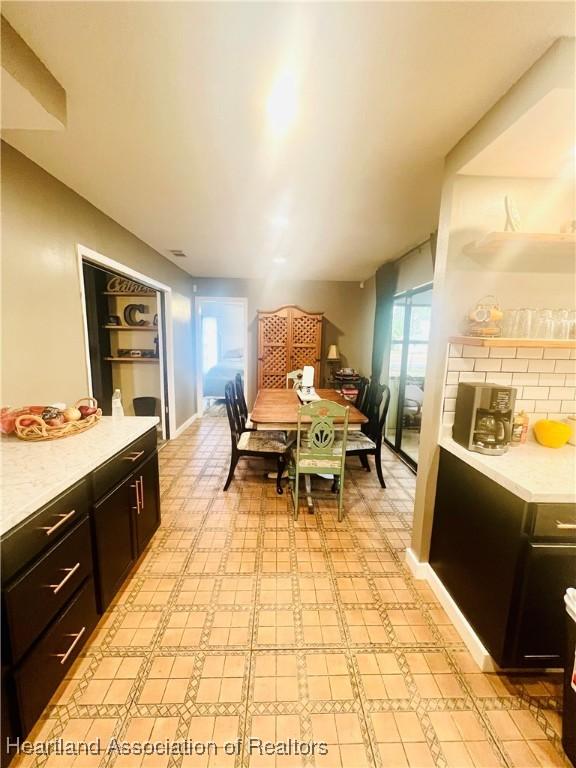 300 Whatley Blvd, Sebring, FL 33870 - dining room with light floors and baseboards