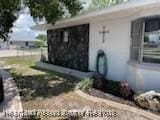 300 Whatley Blvd, Sebring, FL 33870 - view of home's exterior featuring stucco siding