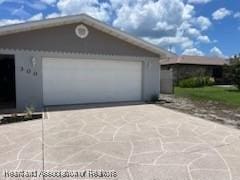 300 Whatley Blvd, Sebring, FL 33870 - garage with driveway