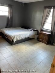 300 Whatley Blvd, Sebring, FL 33870 - bedroom featuring tile patterned flooring