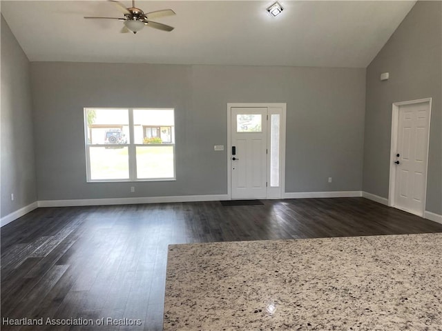3900 Santiago St, Sebring, FL 33872 - foyer featuring ceiling fan, dark wood-style flooring, and lofted ceiling