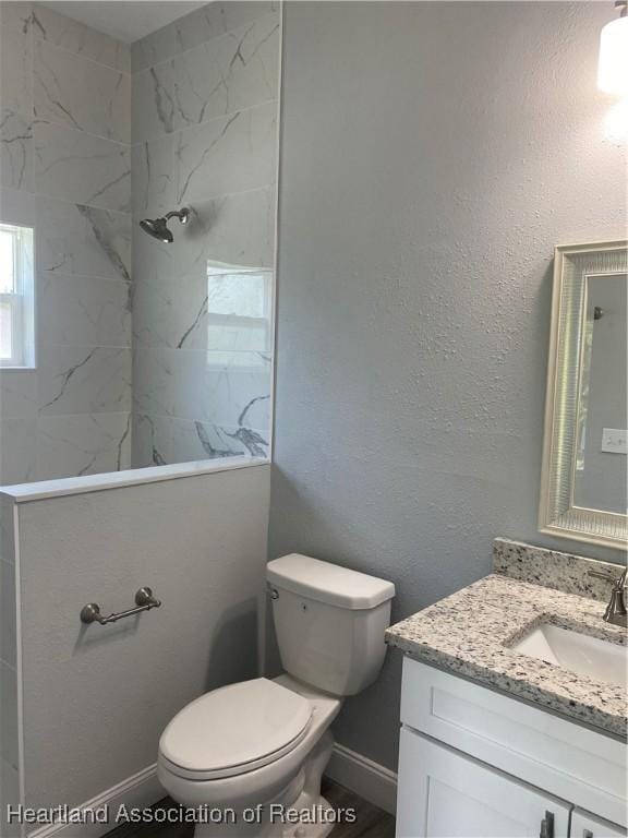 3900 Santiago St, Sebring, FL 33872 - bathroom with vanity and a marble finish shower