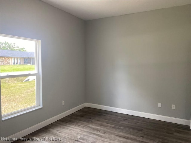 3900 Santiago St, Sebring, FL 33872 - spare room with dark wood finished floors