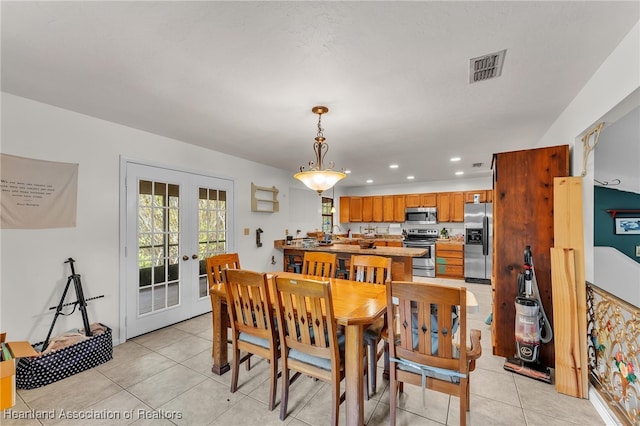 5324 Lafayette Ave, Sebring, FL 33875 - dining room featuring light tile patterned floors, french doors, recessed lighting, and visible vents