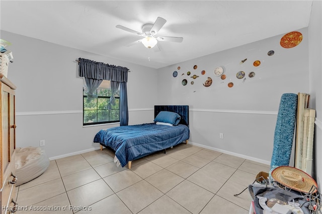 5324 Lafayette Ave, Sebring, FL 33875 - bedroom with light tile patterned floors, baseboards, and ceiling fan
