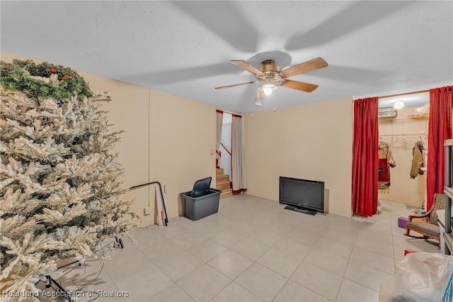 5324 Lafayette Ave, Sebring, FL 33875 - unfurnished living room featuring stairway and a ceiling fan