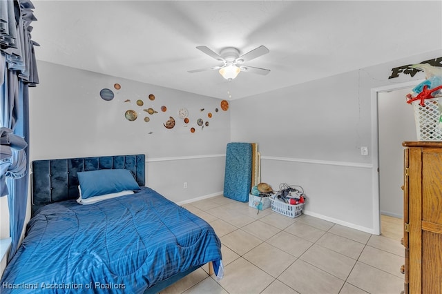 5324 Lafayette Ave, Sebring, FL 33875 - bedroom featuring a ceiling fan, baseboards, and light tile patterned floors