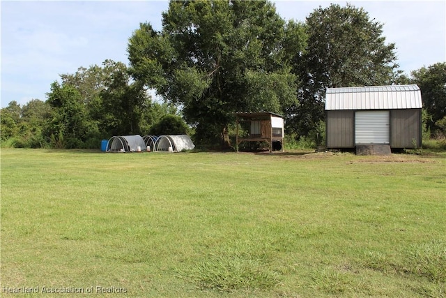 5195 Greenfields Run, Zolfo Springs, FL 33890 - view of green lawn with a shed