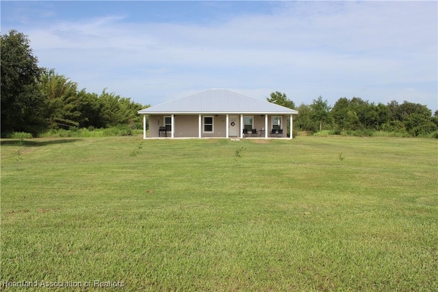 5195 Greenfields Run, Zolfo Springs, FL 33890 - view of front of home featuring a front lawn and a patio