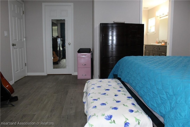 5195 Greenfields Run, Zolfo Springs, FL 33890 - bedroom featuring dark wood-style floors and ensuite bathroom