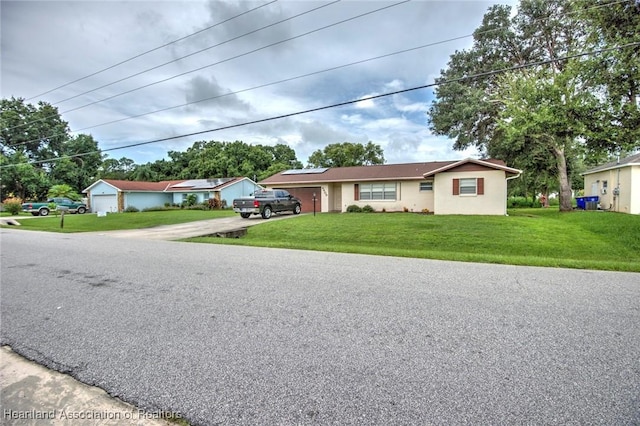 view of front of property with a front lawn