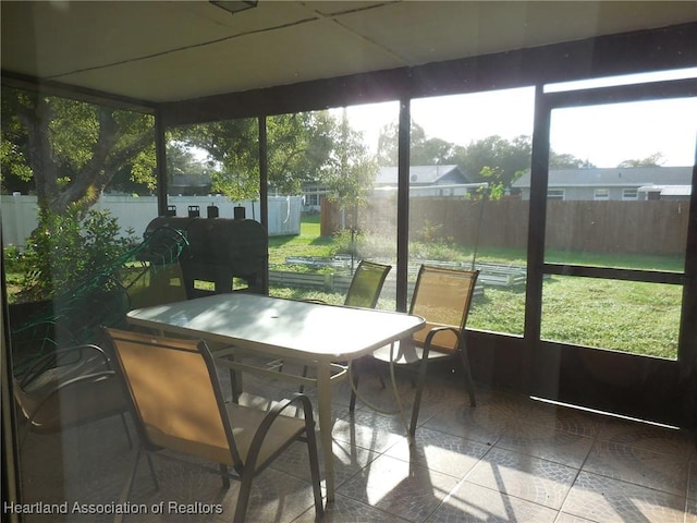 sunroom / solarium with a wealth of natural light