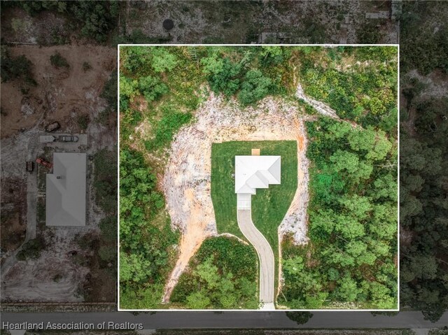 9131 Canter Path, Sebring, FL 33875 - aerial view of property and surrounding area with property boundaries highlighted