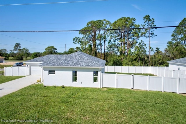 view of home's exterior with a yard