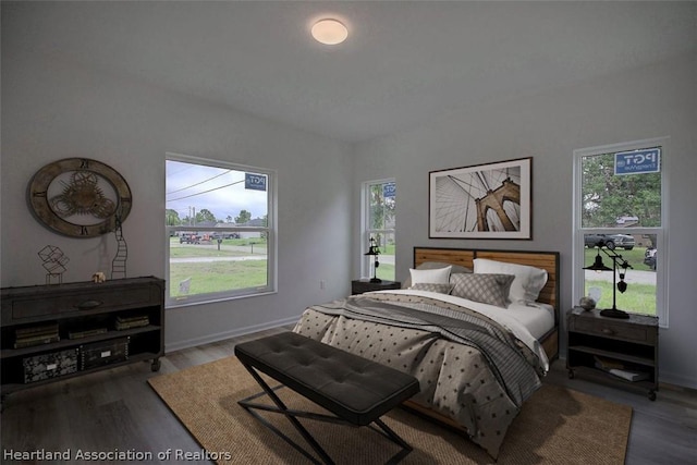 bedroom featuring wood-type flooring