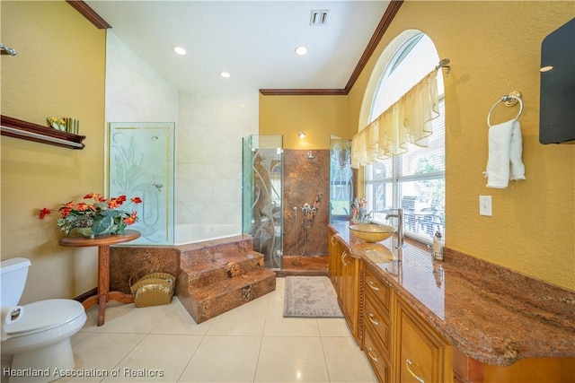 14630 Luray Rd, Southwest Ranches, FL 33330 - bathroom featuring tile patterned flooring, toilet, a garden tub, walk in shower, and crown molding
