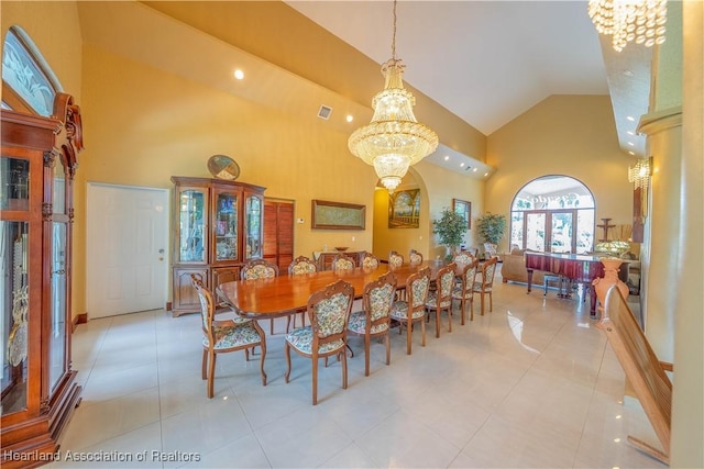 14630 Luray Rd, Southwest Ranches, FL 33330 - dining area with a chandelier, high vaulted ceiling, light tile patterned flooring, and recessed lighting
