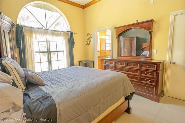 14630 Luray Rd, Southwest Ranches, FL 33330 - tiled bedroom featuring ornamental molding and ensuite bath
