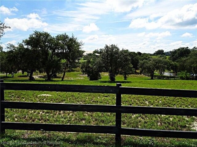 exterior space with a rural view