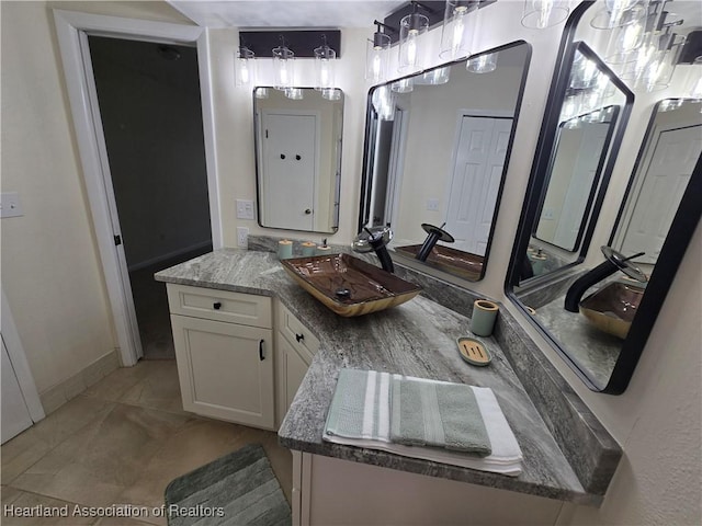2713 Par Rd, Sebring, FL 33872 - full bathroom featuring double vanity and baseboards