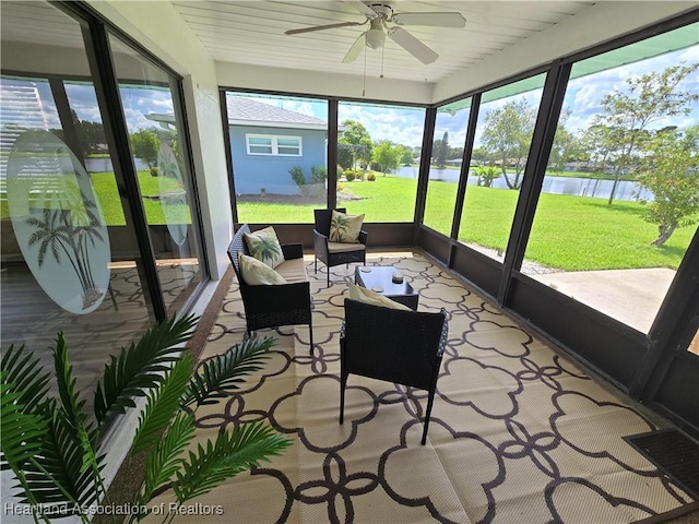 2713 Par Rd, Sebring, FL 33872 - sunroom featuring a water view, ceiling fan, and outdoor lounge area