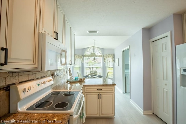 kitchen with white appliances, decorative light fixtures, tasteful backsplash, and a notable chandelier