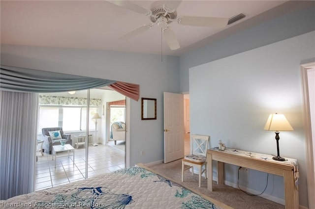 bedroom featuring ceiling fan and light carpet