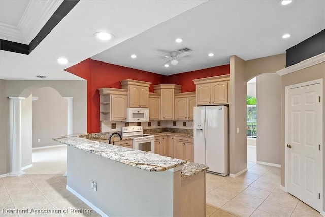 kitchen featuring ornate columns, ceiling fan, light brown cabinets, kitchen peninsula, and white appliances