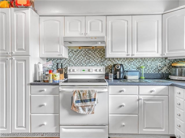 kitchen featuring under cabinet range hood, white electric stove, white cabinetry, and backsplash