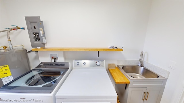 397 Maude Rd, Wauchula, FL 33873 - laundry area with electric panel, washer and clothes dryer, a sink, and cabinet space