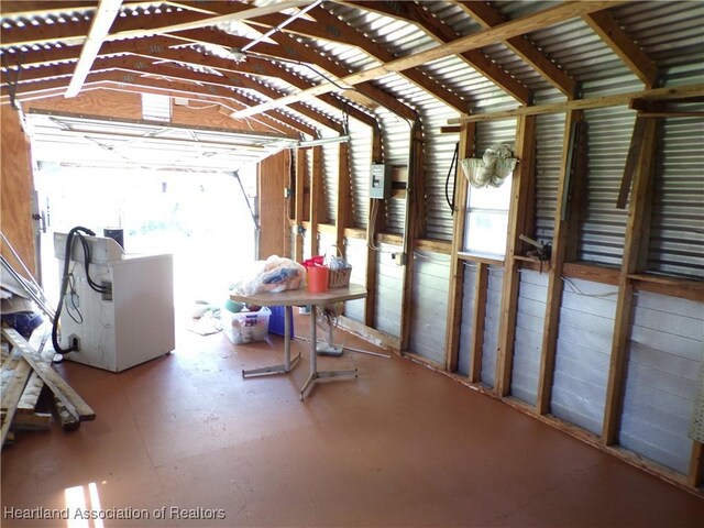 interior space featuring plenty of natural light and lofted ceiling